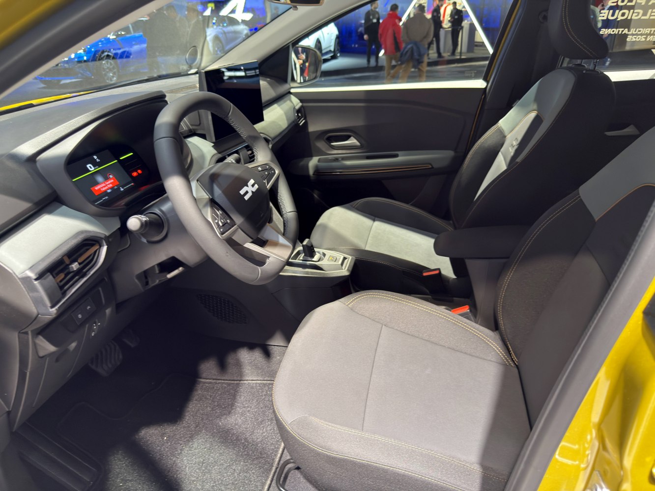 Digital instrument cluster and ergonomic front seats of a modern compact car interior