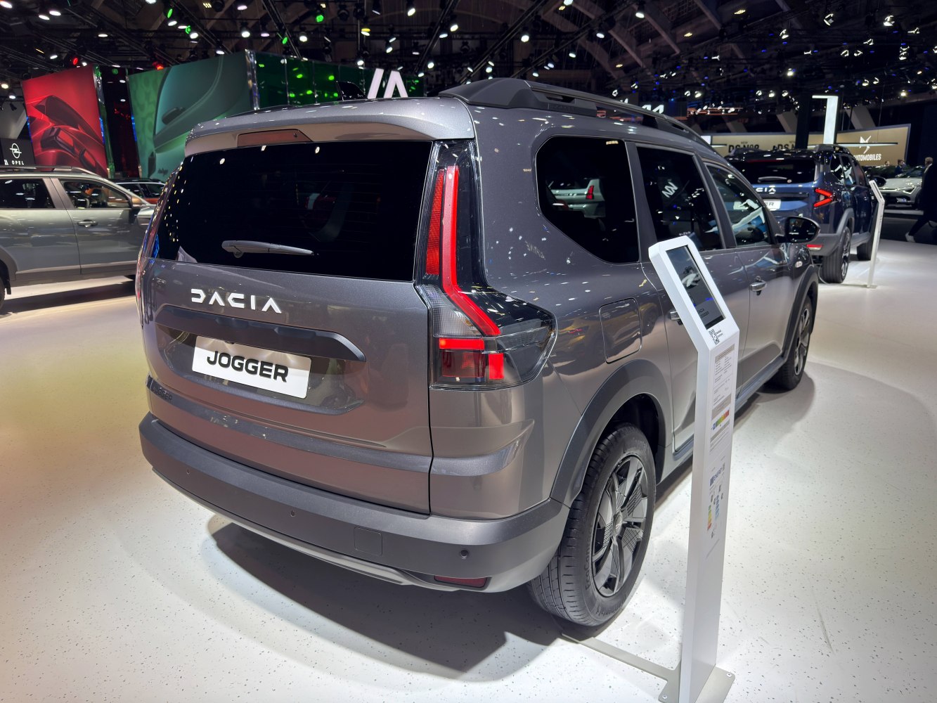Rear view with sleek taillight and roof rack design.