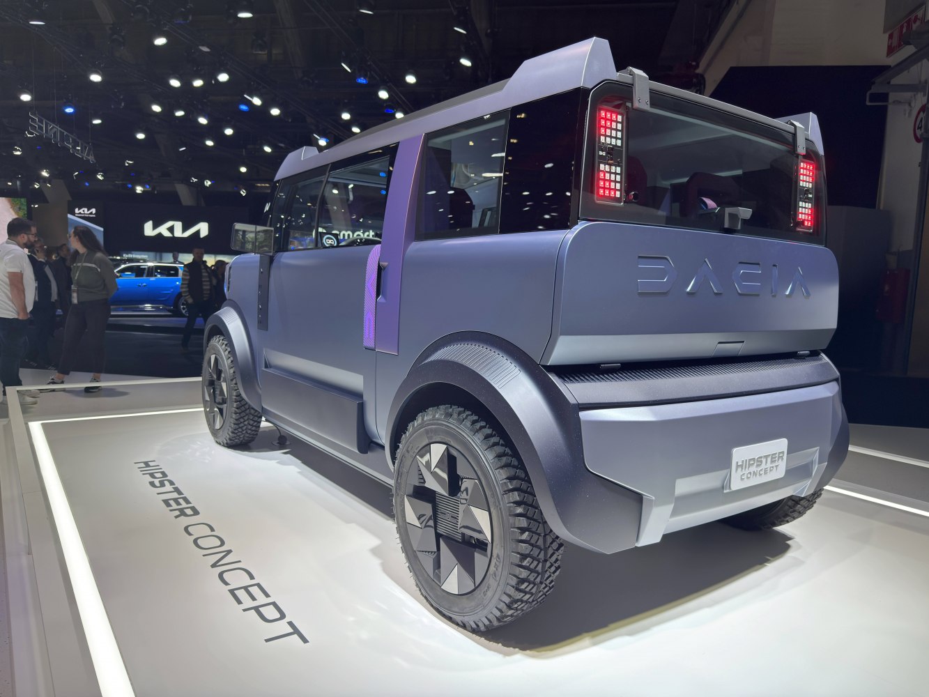 Rear view of futuristic SUV with angular design and rugged tires