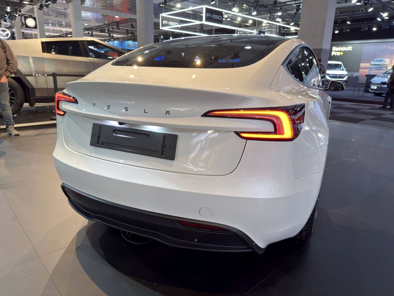 Rear view showcase of modern sleek LED taillights and trunk design