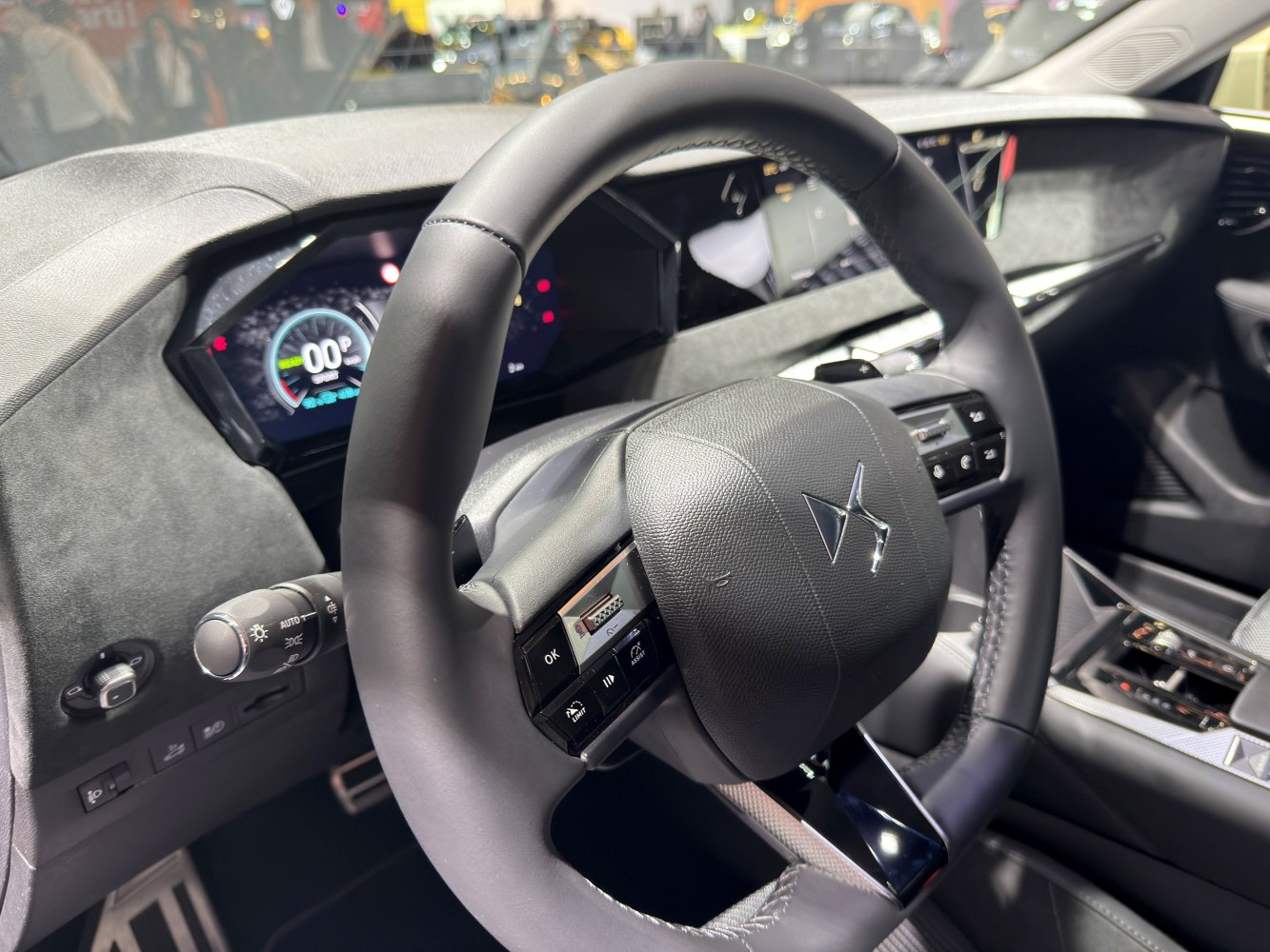 Luxury steering wheel and digital dashboard in modern vehicle interior