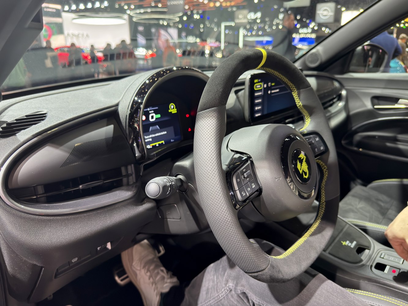 Digital dashboard and sport steering wheel with yellow stitching
