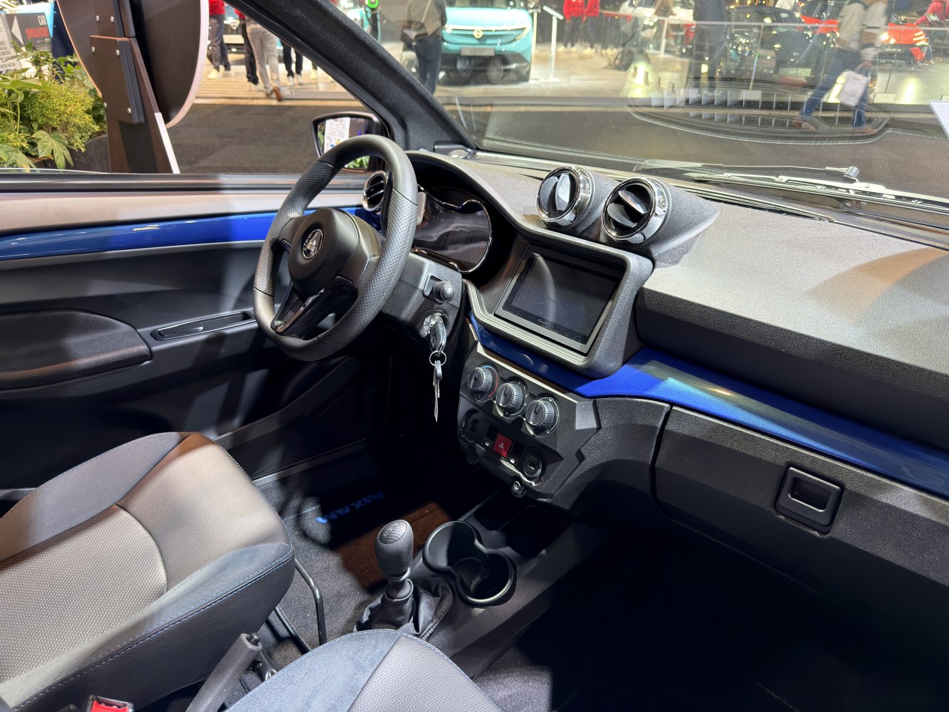 Compact modern dashboard and cockpit with touchscreen and ventilation controls