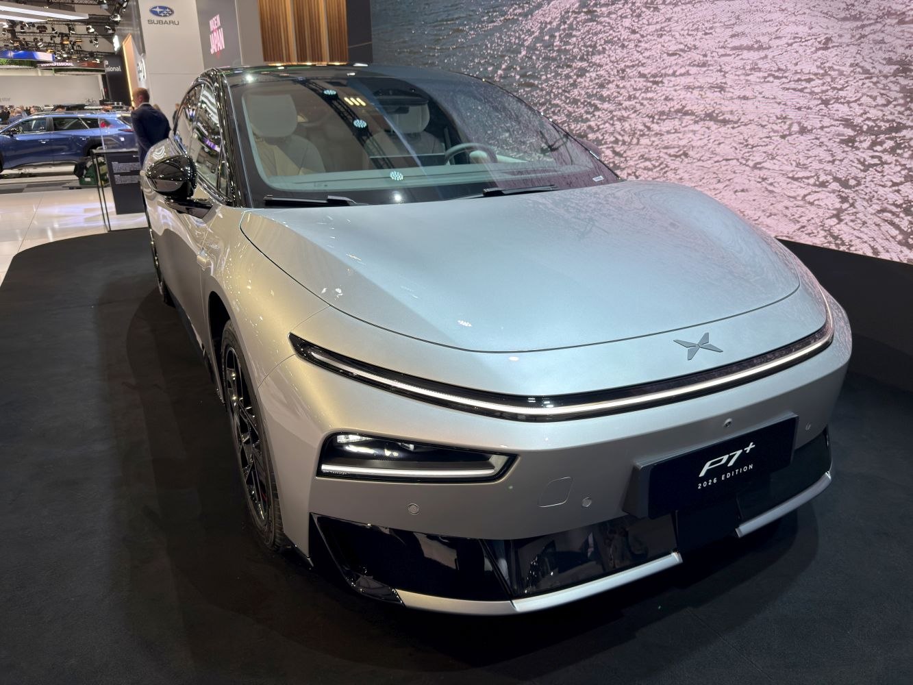 Sleek front design with LED headlight strip and daytime running lights.