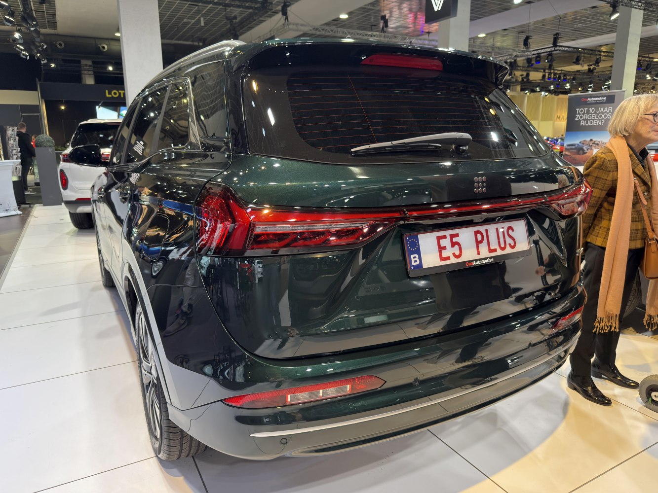 Rear view of SUV with sleek taillight and rear windshield wiper