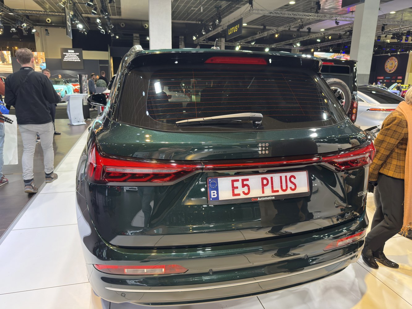 Rear view of a vehicle with LED tail lights and rear wiper