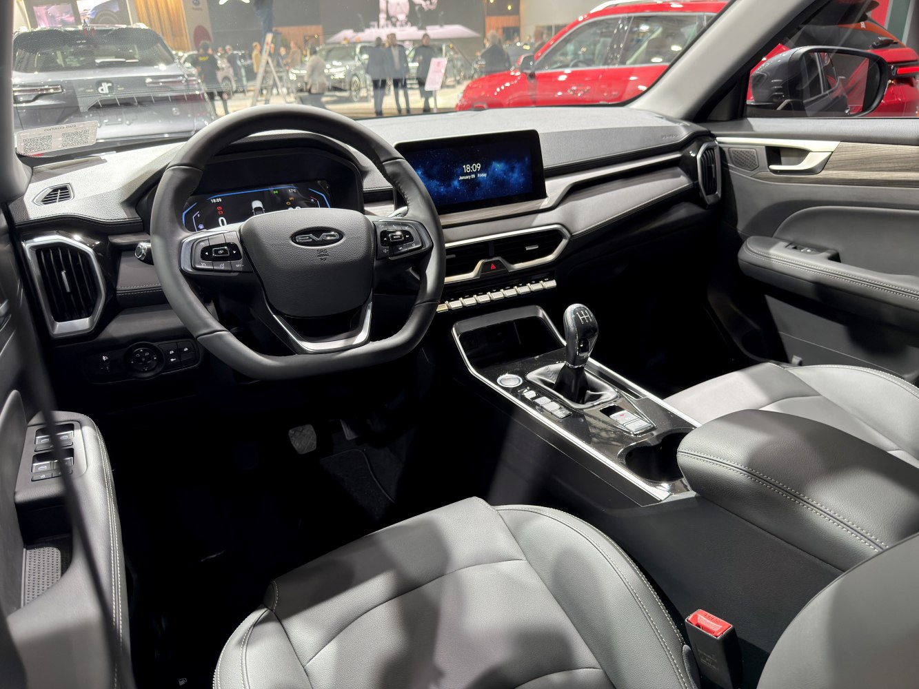 Digital dashboard and manual gearbox in modern car interior