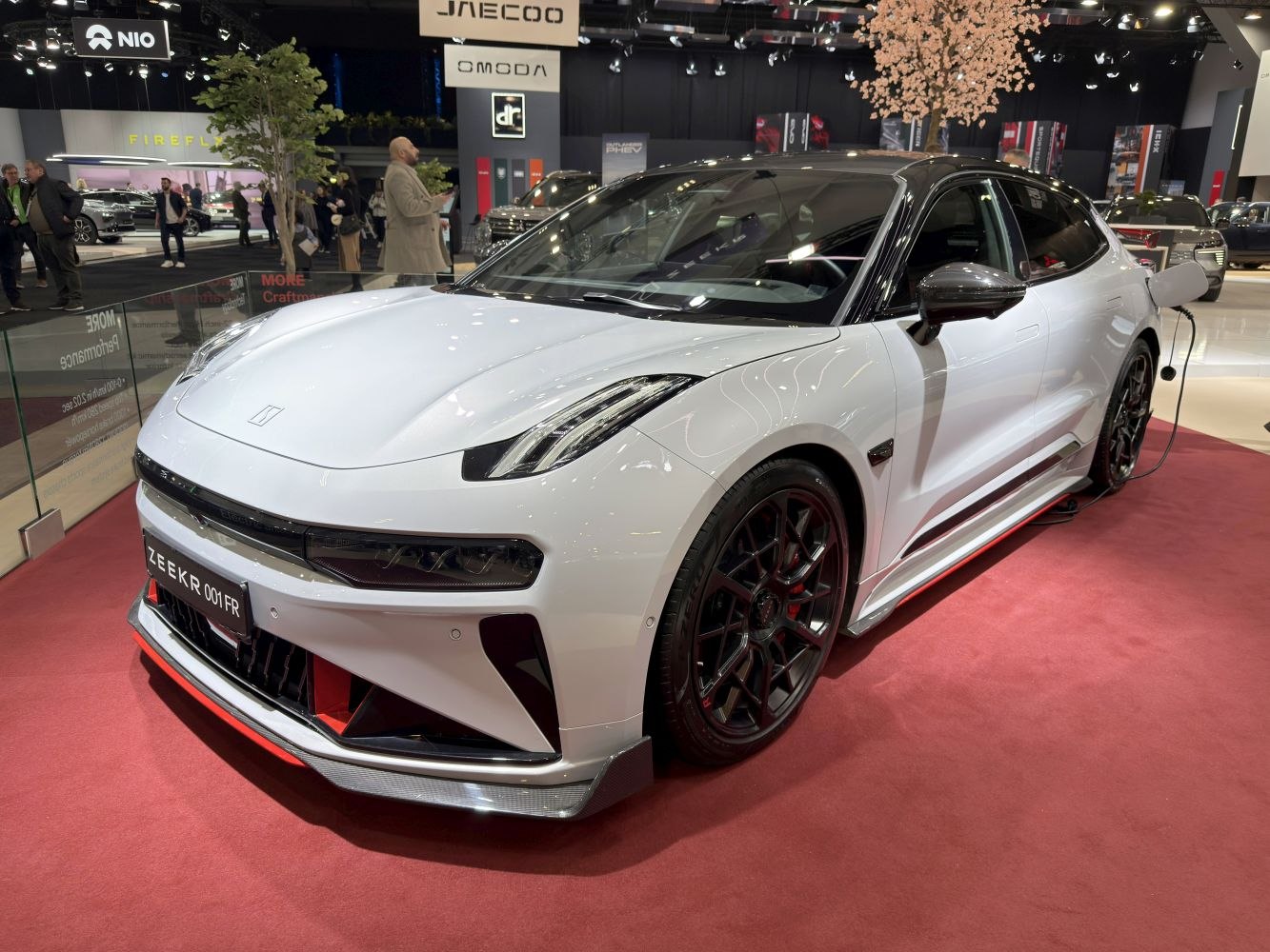 Updated front design and LED headlights on a white electric vehicle