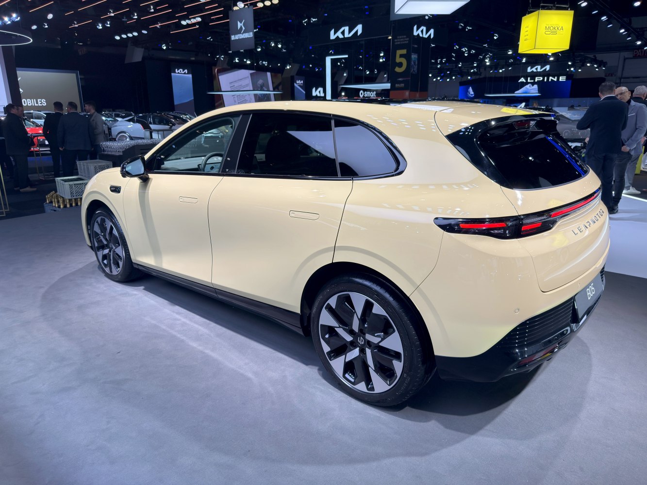 Sleek 2026 electric SUV rear with flush door handles and modern alloy wheels