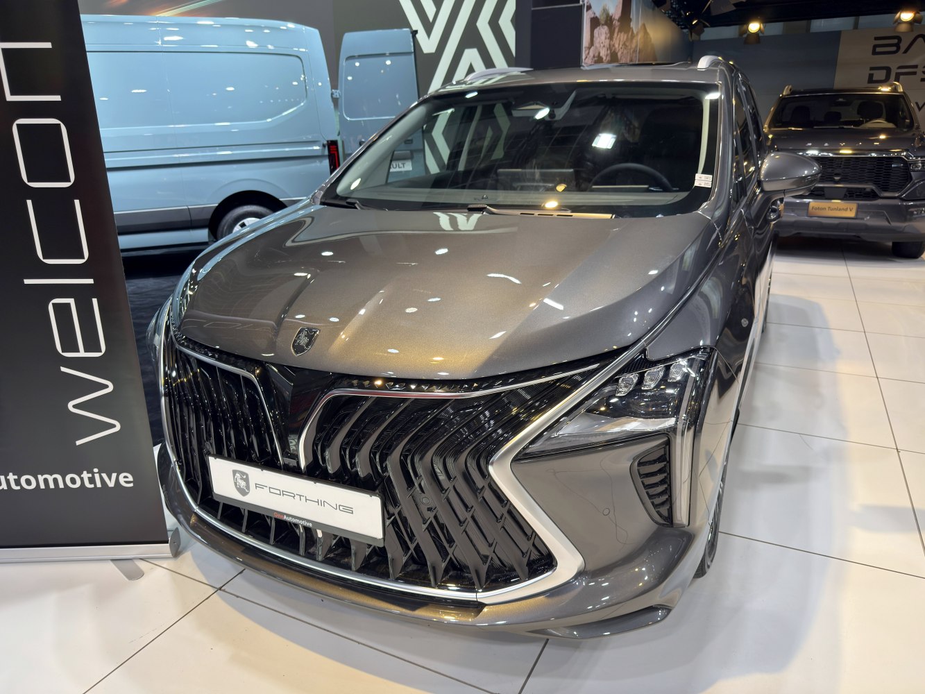 Prominent black grille and sharp LED headlights on front fascia