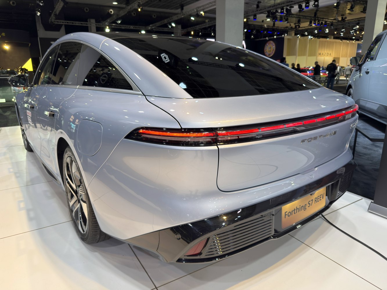 Sleek rear design with continuous LED tail light strip and aerodynamic contours