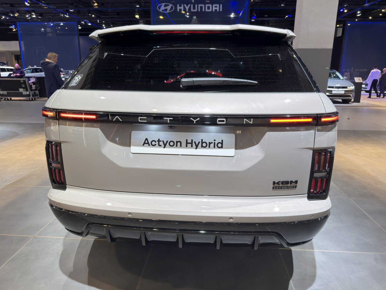 Rear view with horizontal LED taillights and distinctive vertical side light clusters.