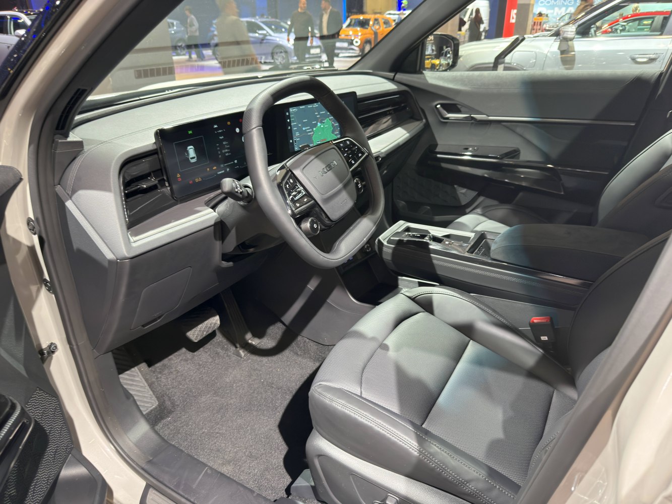 Digital dashboard and multifunction steering wheel inside modern vehicle interior