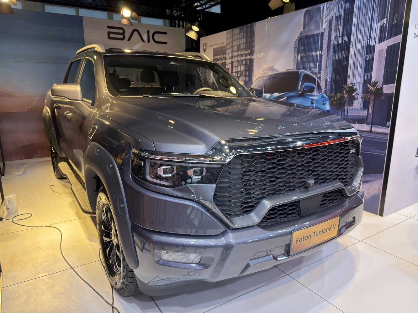 Front view of 2024 pickup with honeycomb grille and LED headlights