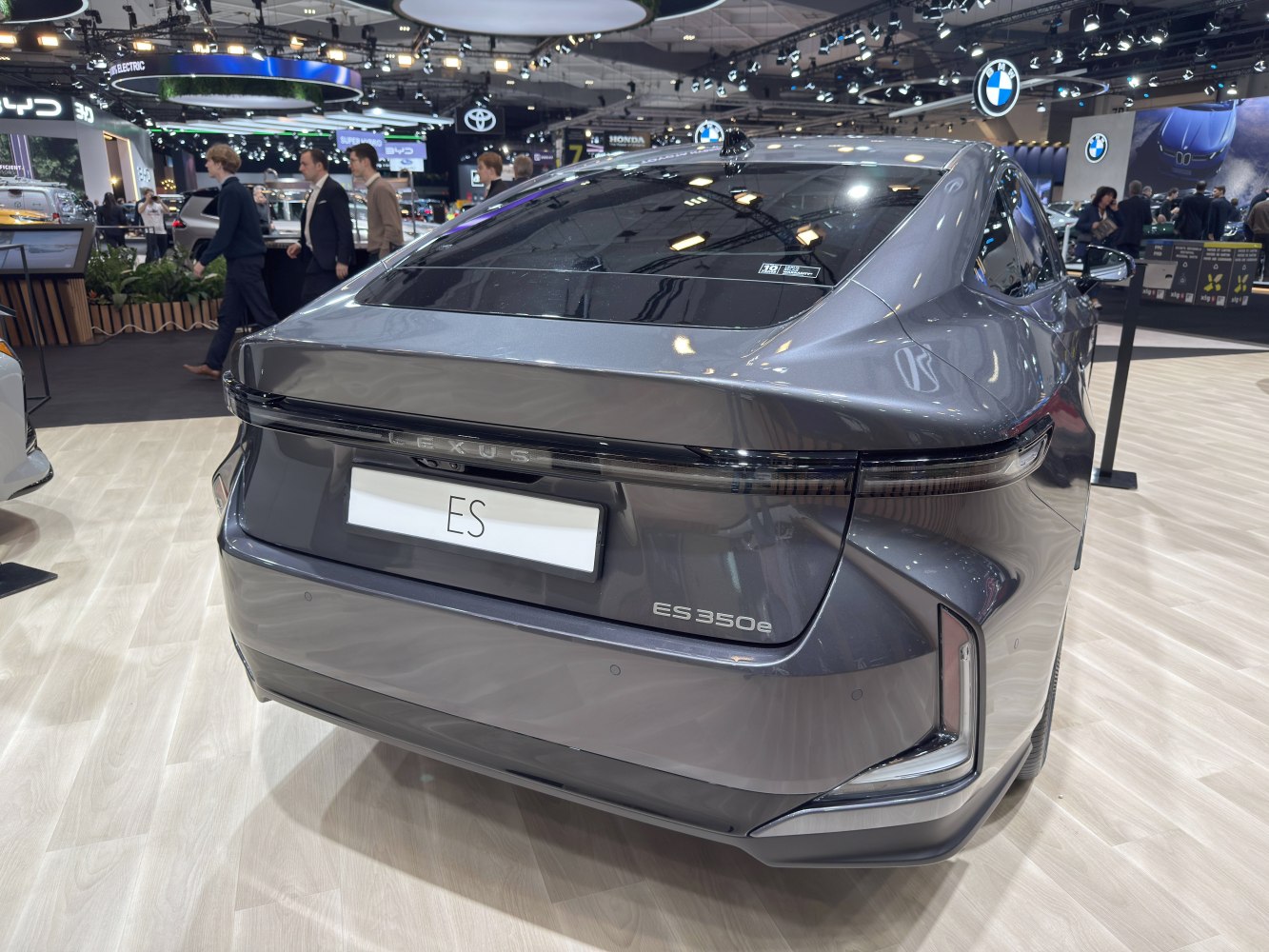 Rear view with continuous tail light strip and modern bumper design