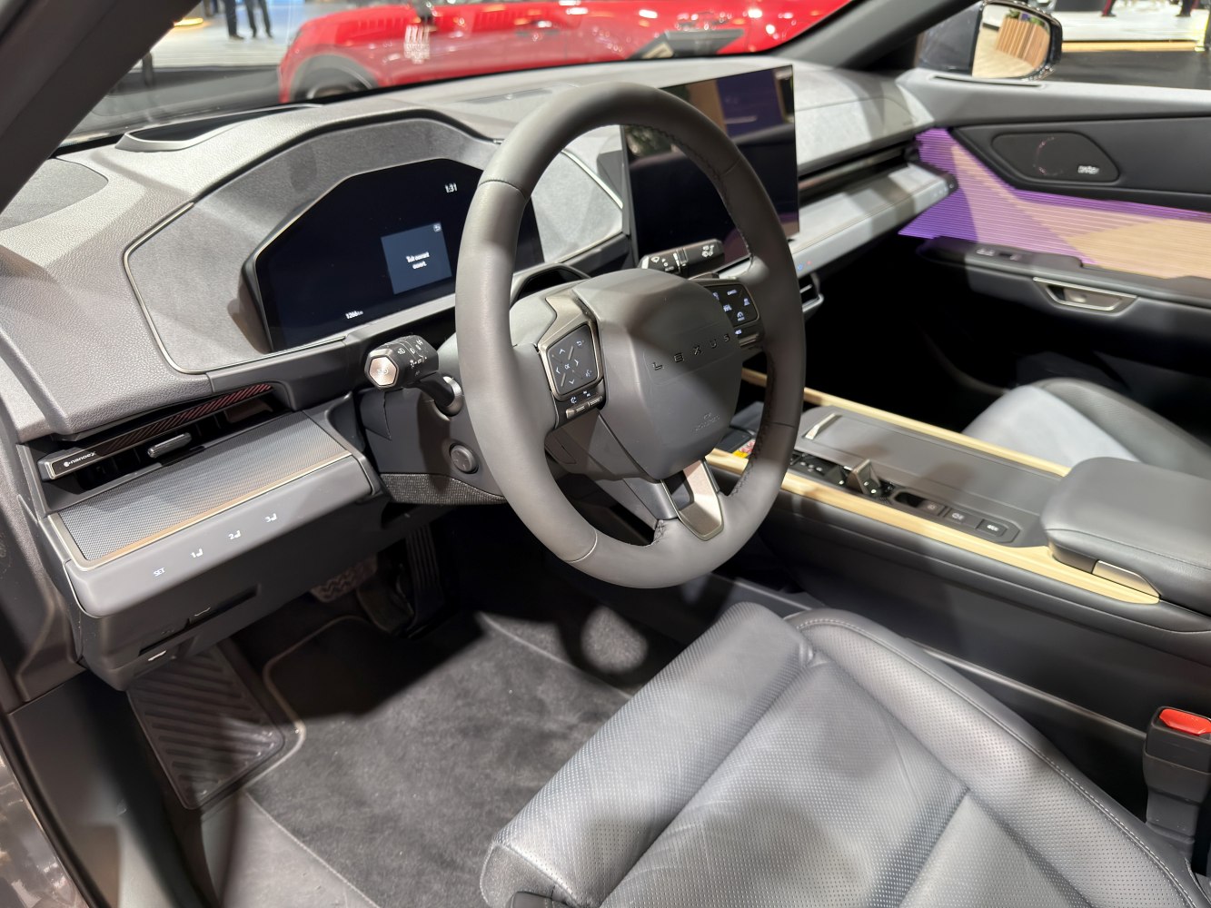 Digital instrument cluster and touchscreen center console in luxury car interior