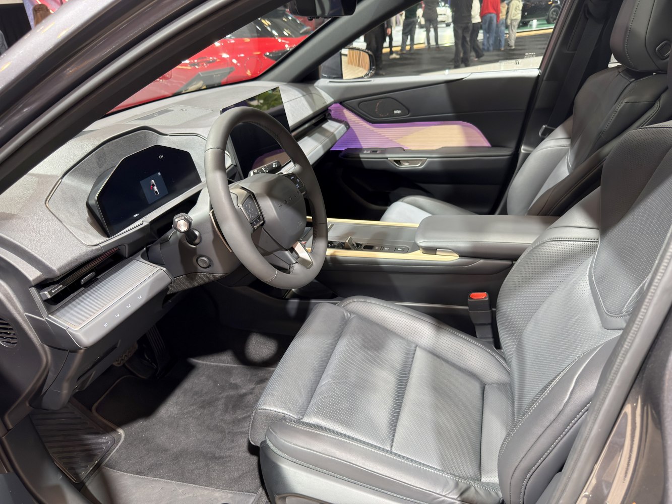 Digital dashboard and leather seats in a modern car interior