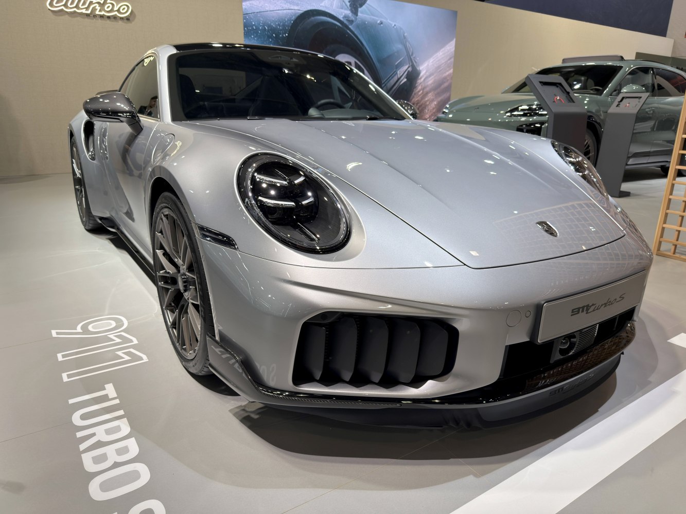Front close-up of Porsche 911 with LED headlights and large air intakes