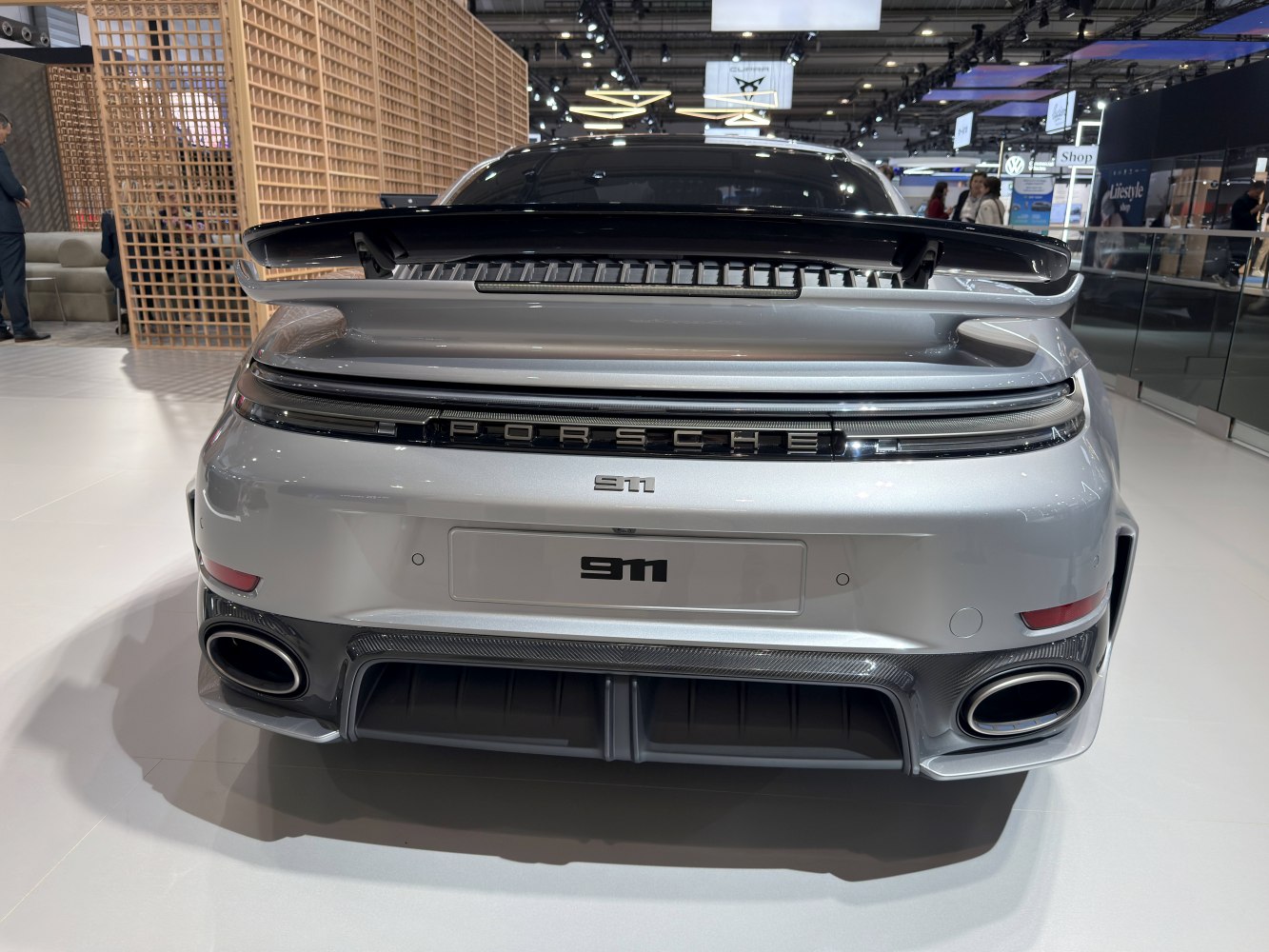 Rear view with active spoiler and dual exhausts