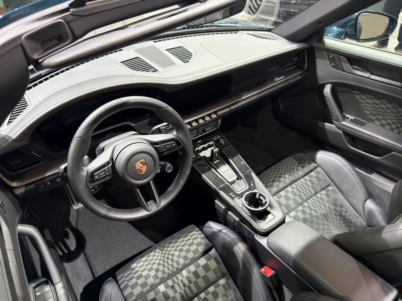 Modern car interior with dashboard and steering wheel