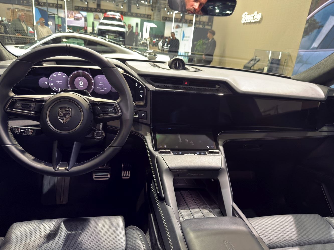 Modern interior with digital instrument cluster and touchscreen display.