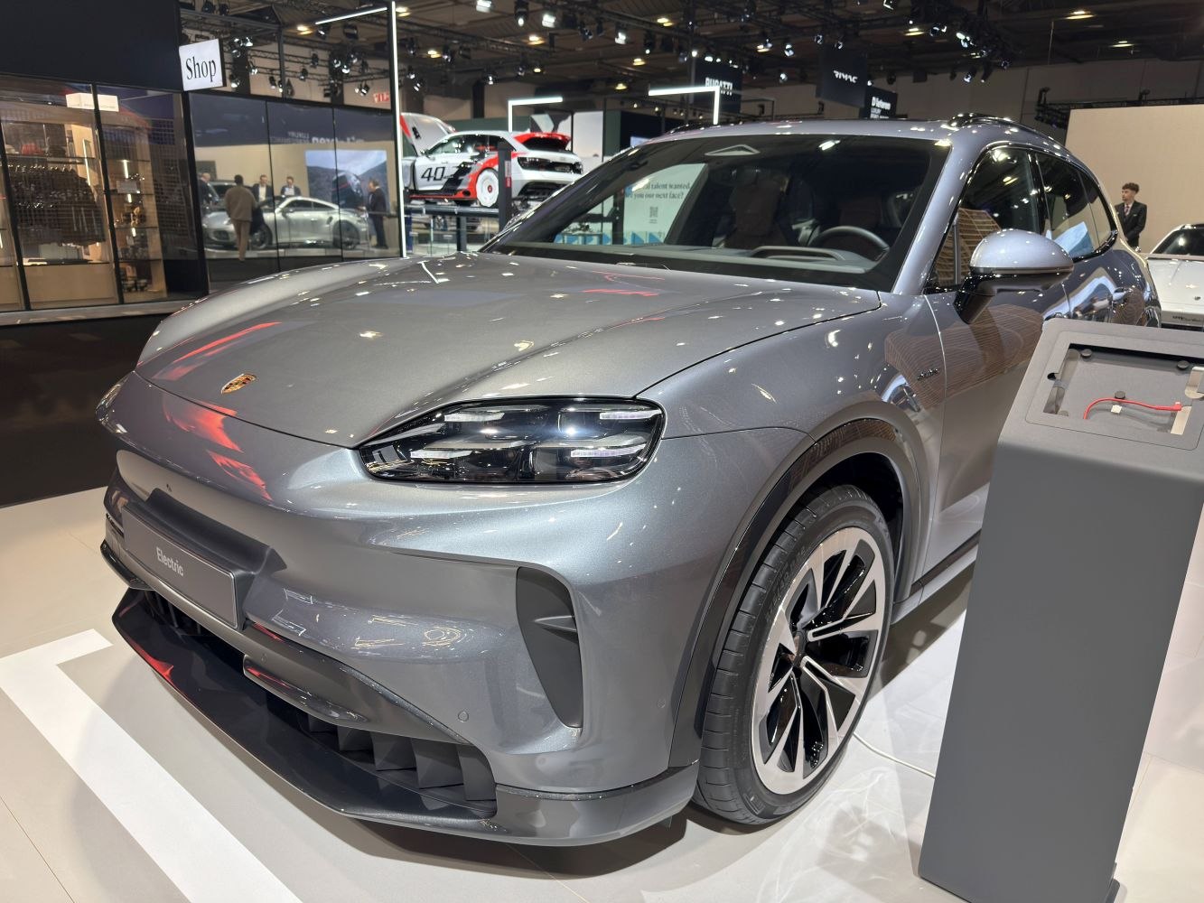 Front angle of an electric SUV showing LED headlights and aerodynamic styling.