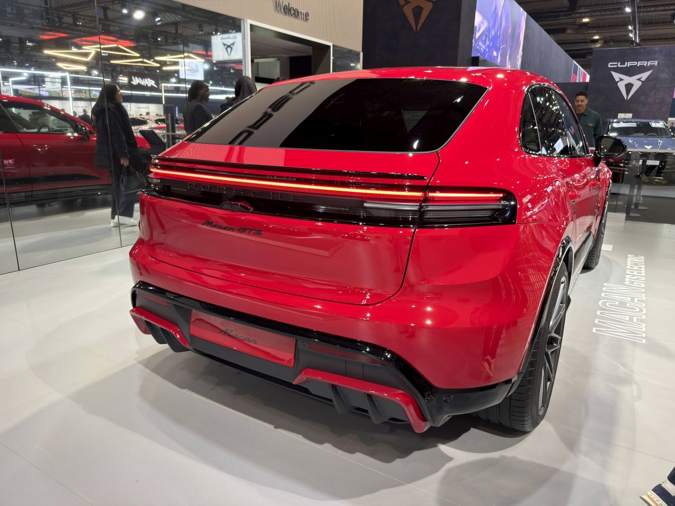 Sleek rear design with continuous LED light bar and sporty diffuser.