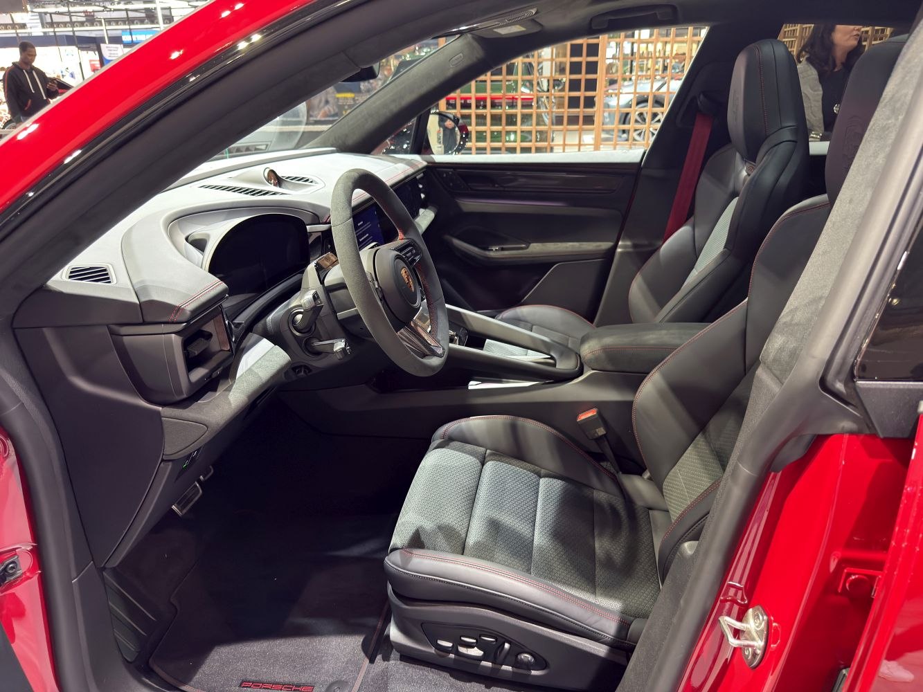 Luxurious interior with digital dashboard and adjustable seats.
