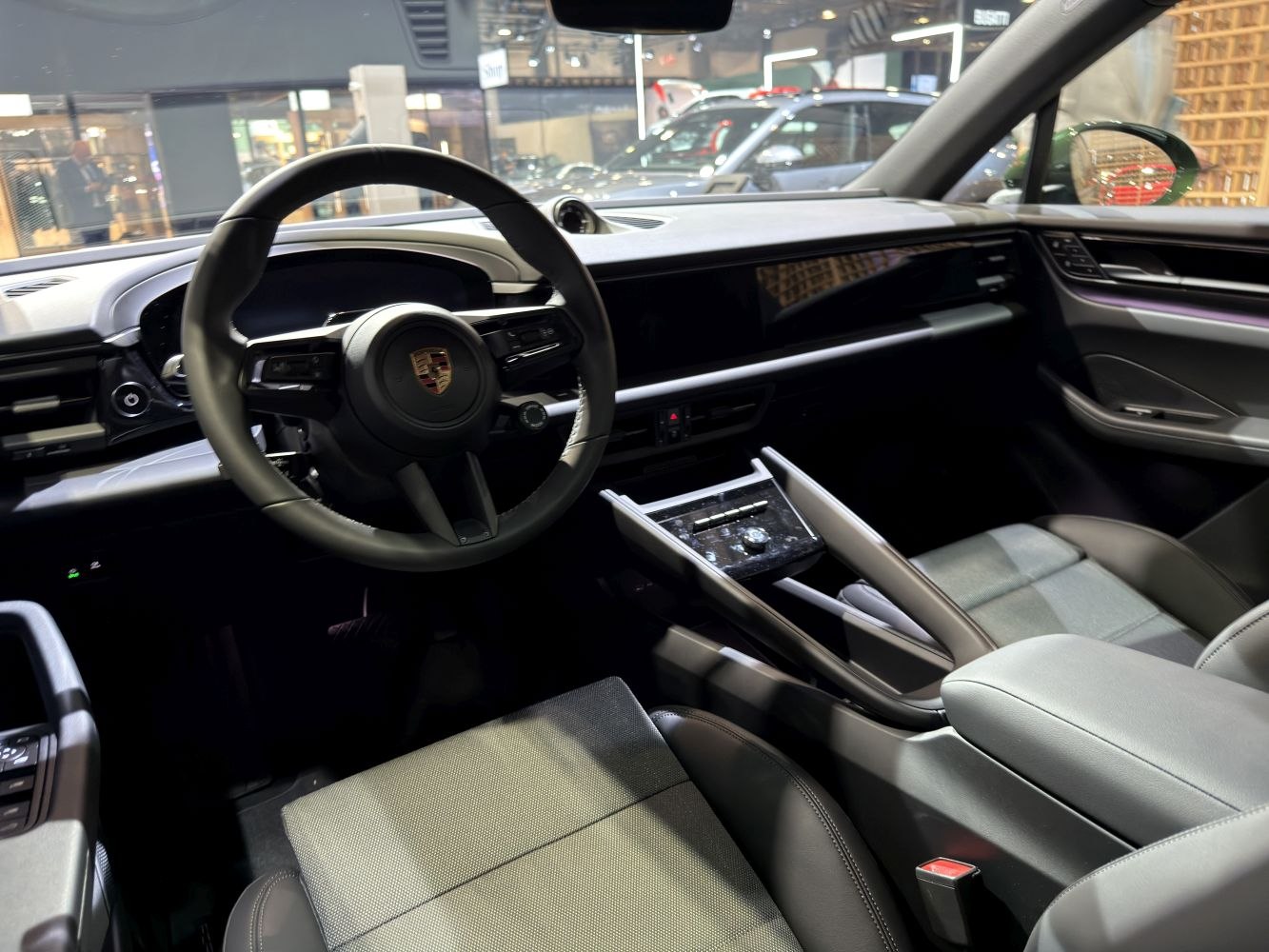 Modern dashboard and steering wheel inside a luxury electric SUV