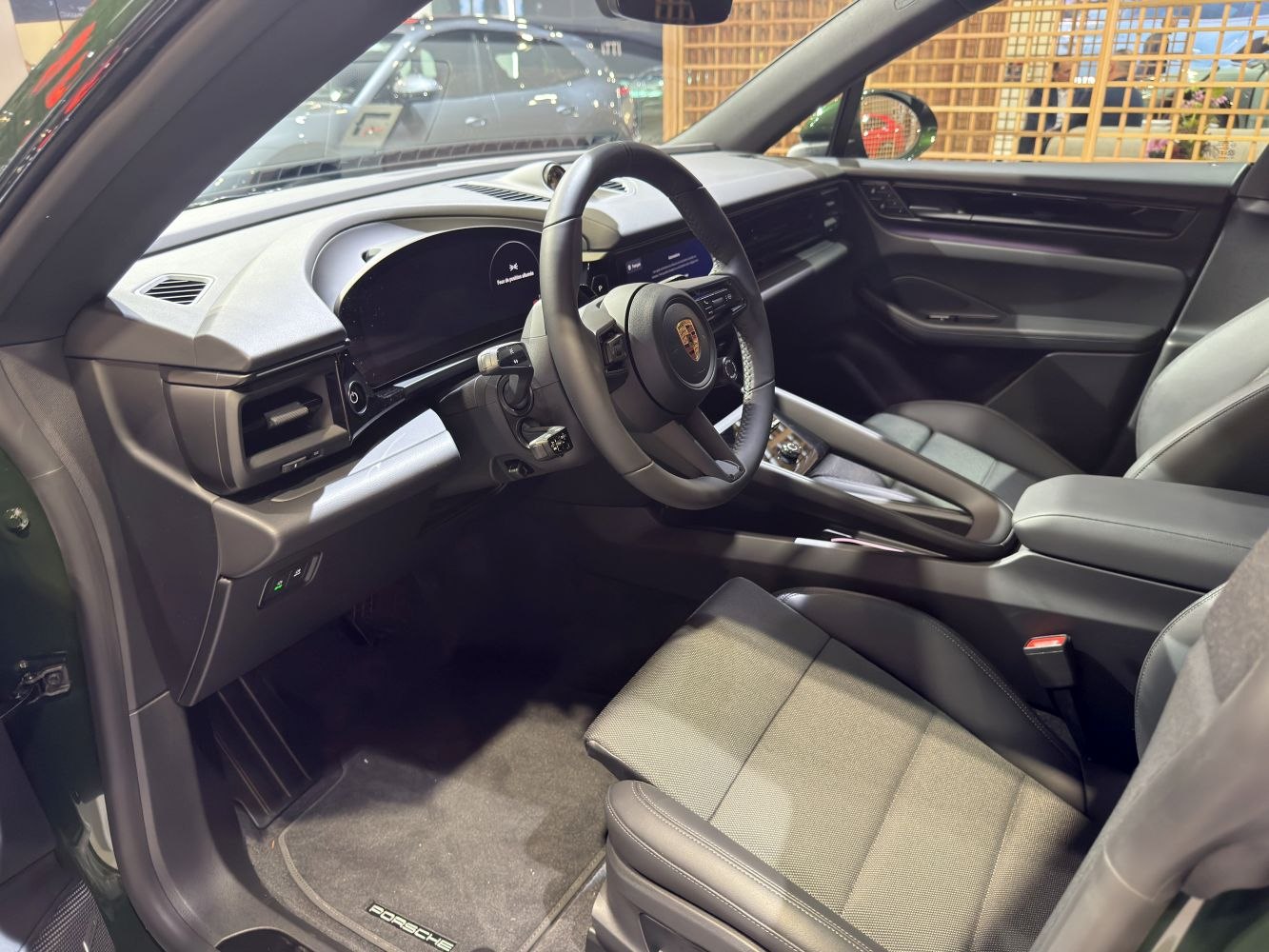 Electric SUV interior with digital dashboard and leather seats