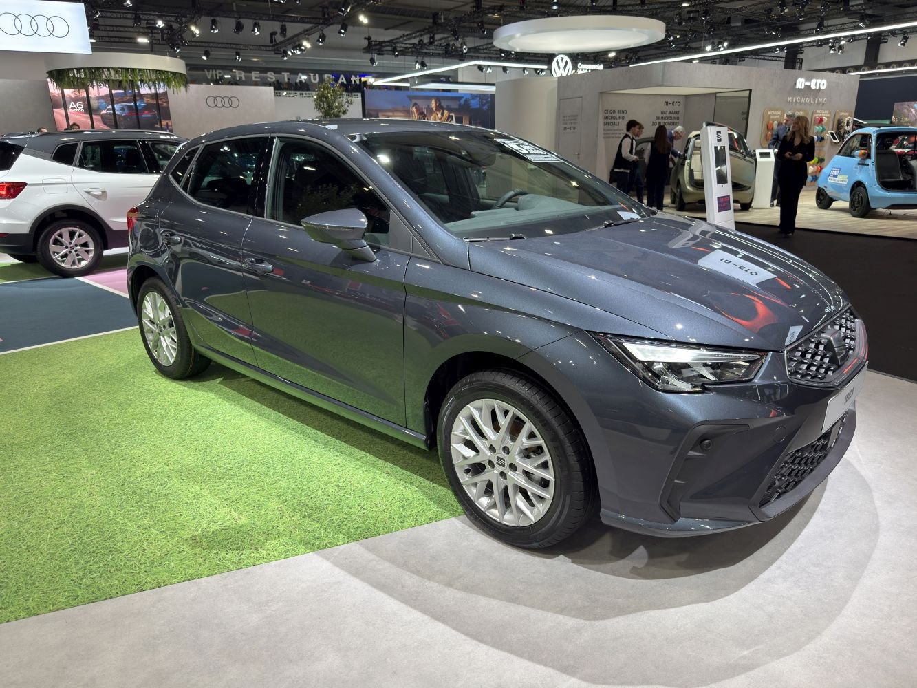 Modern hatchback with sharp LED headlights and detailed front grille