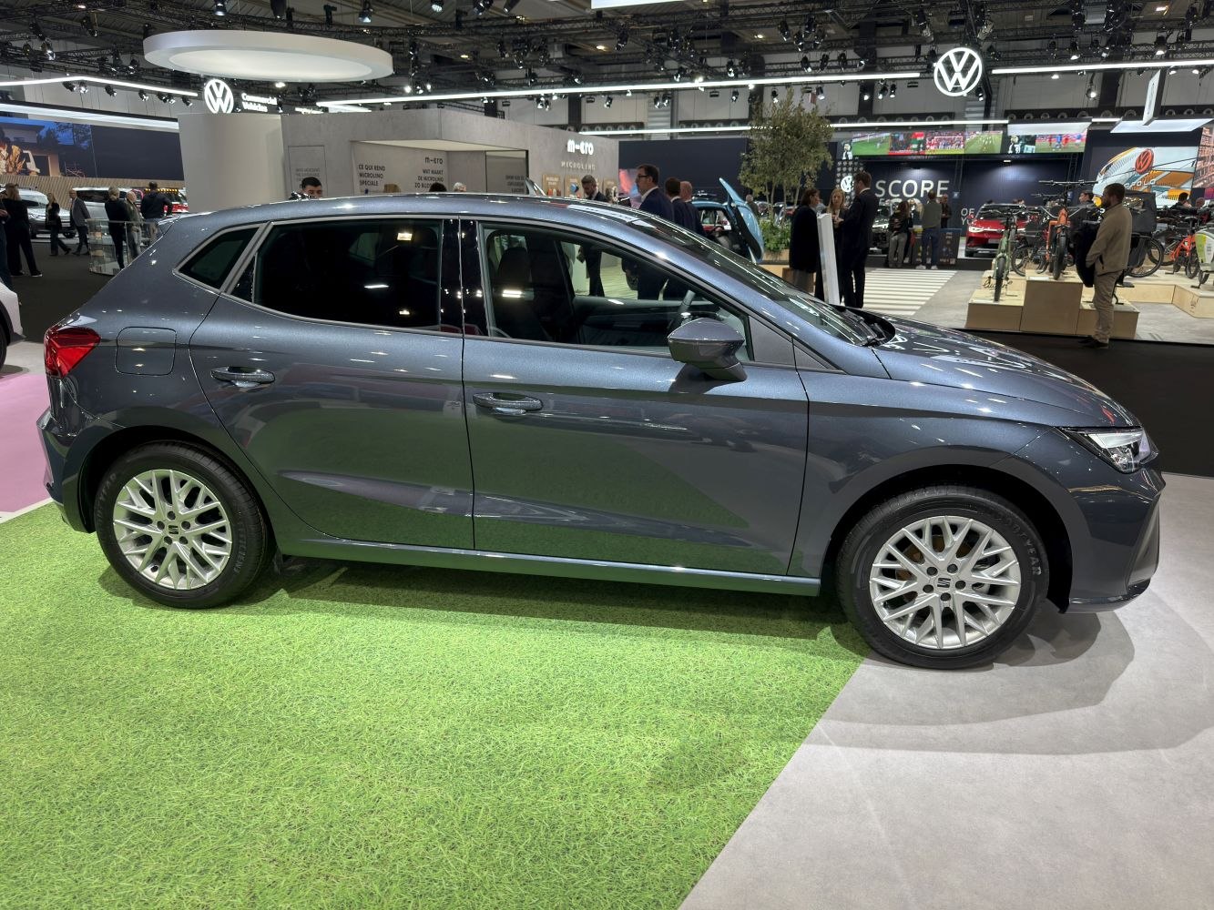 Side profile of modern compact hatchback with alloy wheels