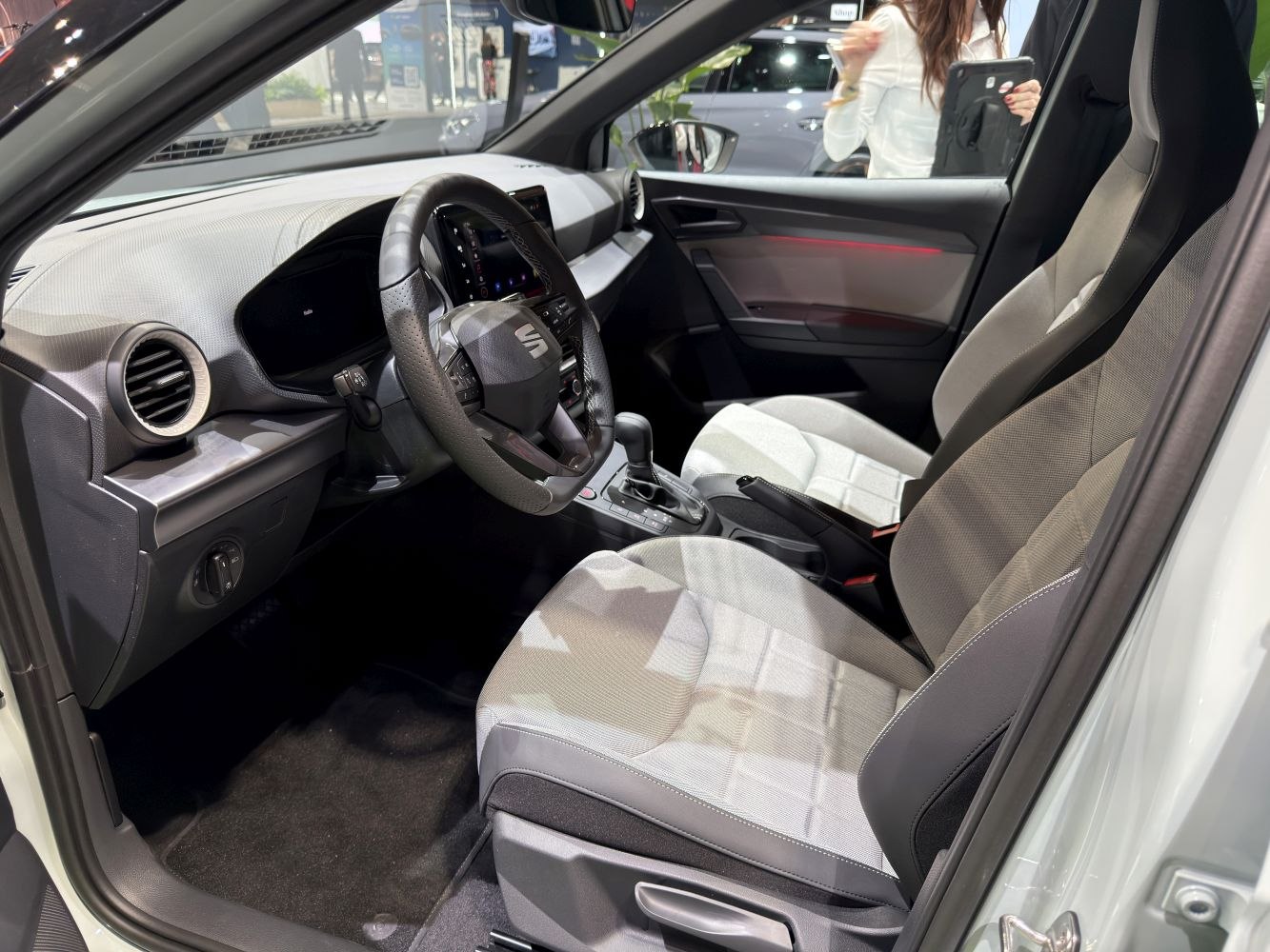 Ergonomic interior with modern dashboard and adjustable seats in compact SUV.