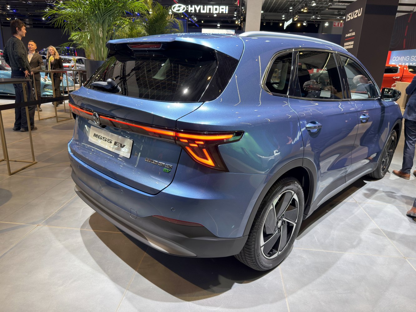 Rear and side view of electric SUV with LED taillights and aerodynamic shape