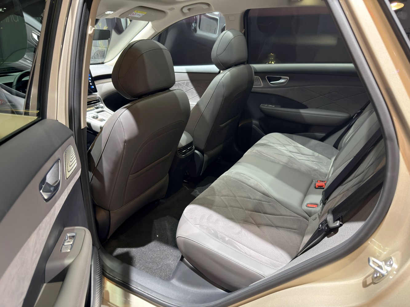 Spacious rear passenger seats with premium upholstery and modern design