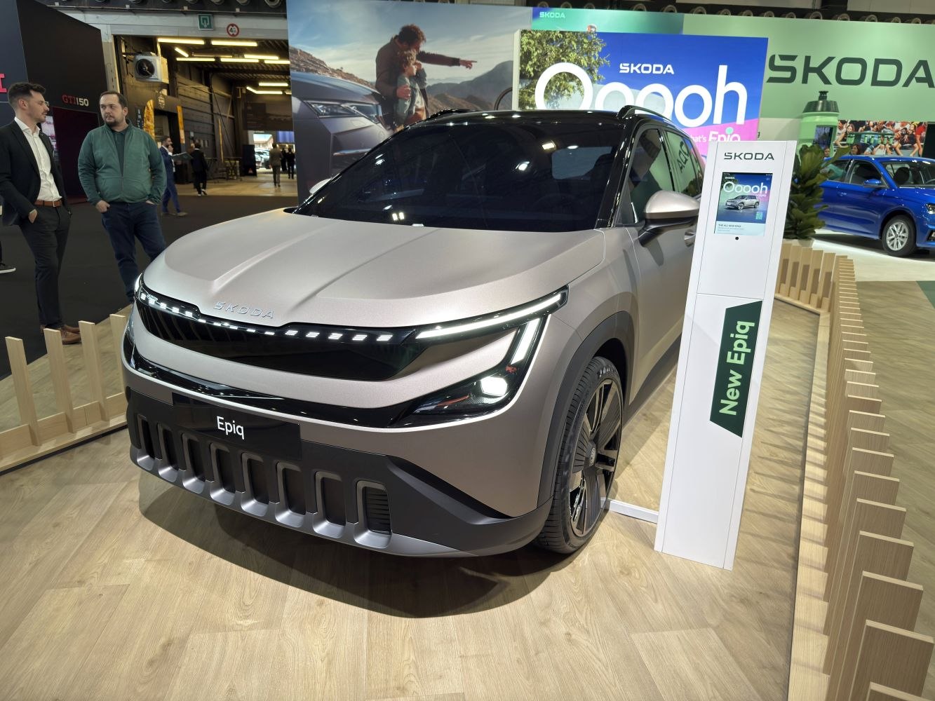 Electric SUV front view with LED daytime running lights and unique grille design