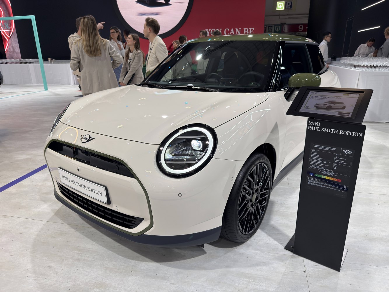 Front view with round LED headlights and distinctive grille design