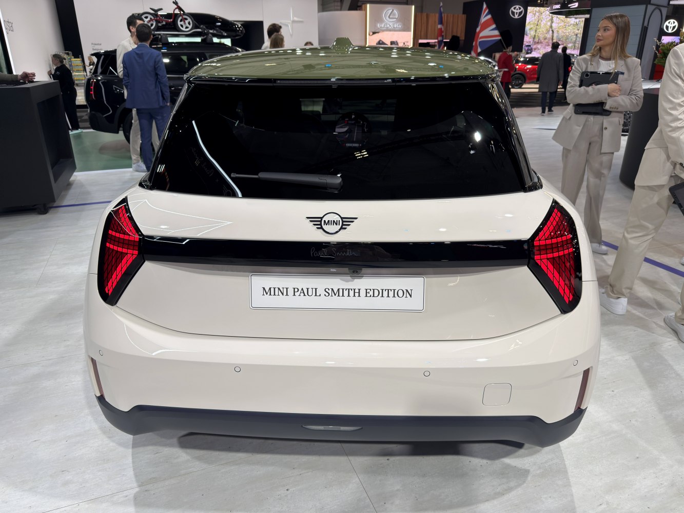 Contemporary rear design with segmented red taillights and rear windshield wiper