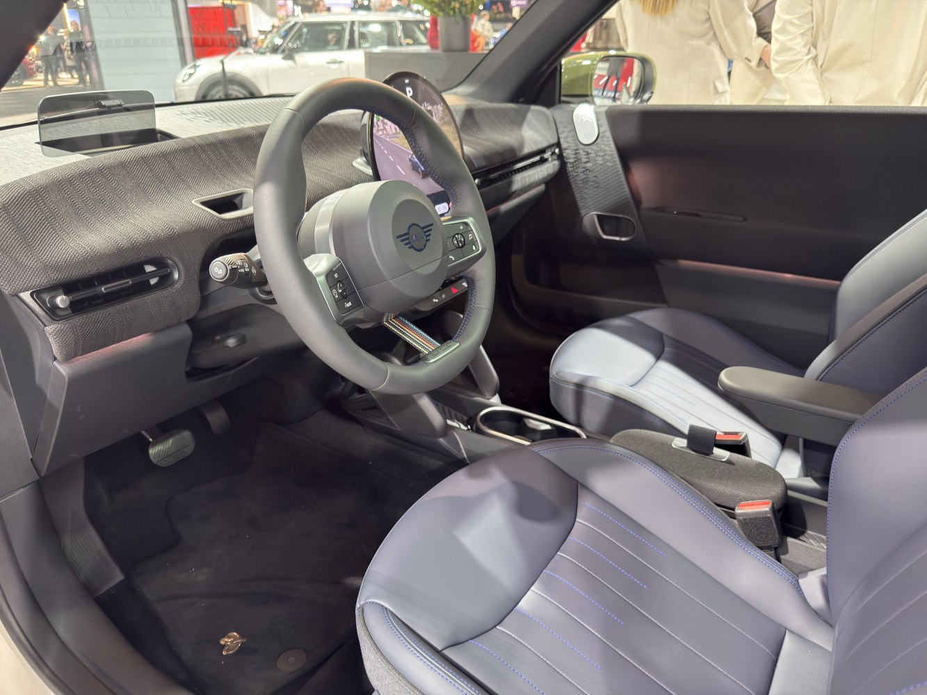 Steering wheel and digital dashboard with modern compact interior design
