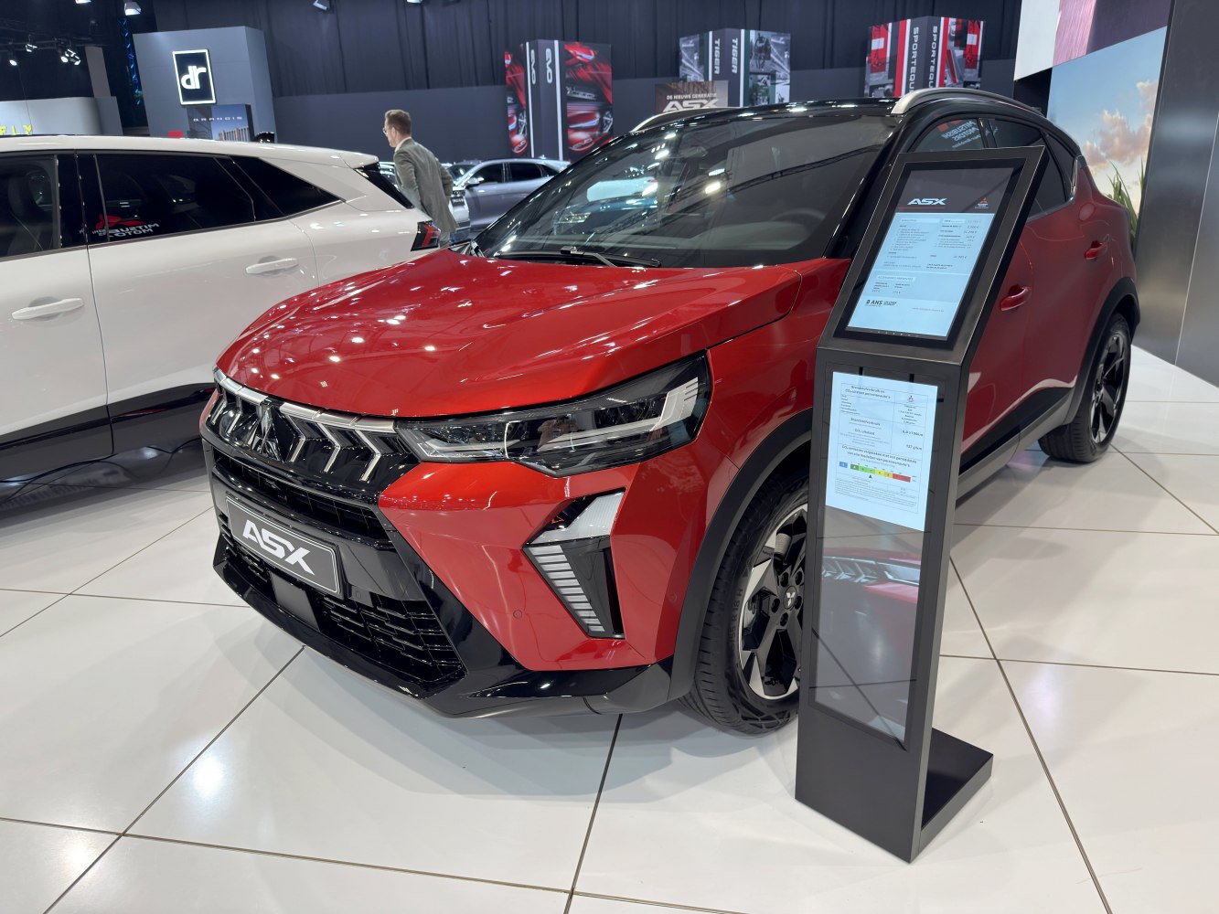 Sporty front grille and sleek LED headlights with modern SUV styling.