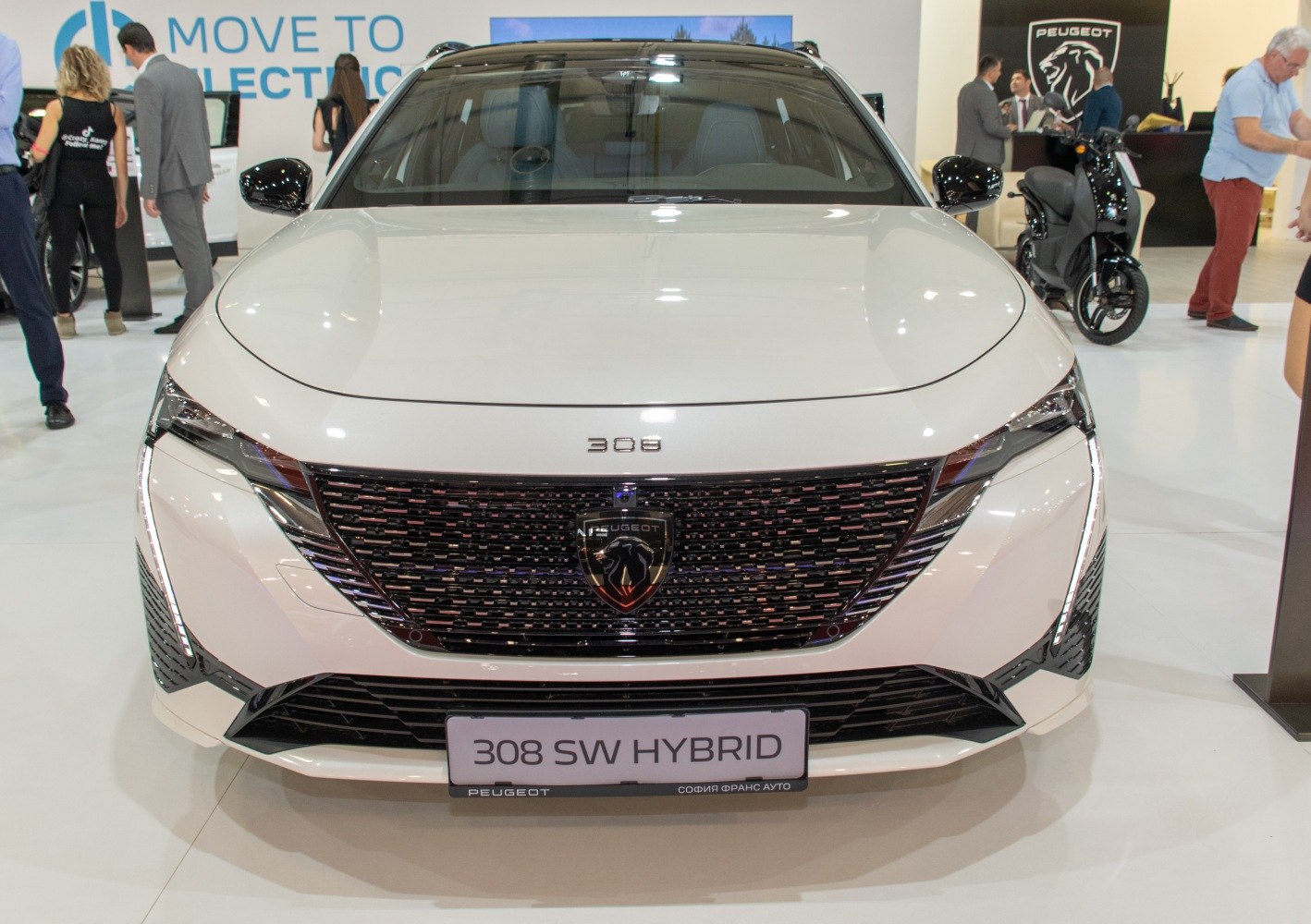 Distinctive front grille with integrated Peugeot badge and sleek headlights