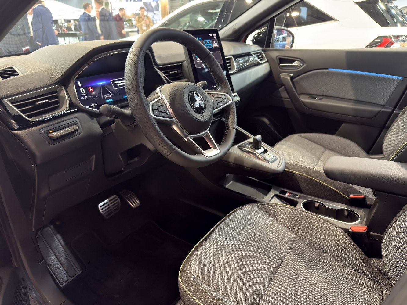 Modern dashboard and multifunction steering wheel in vehicle interior