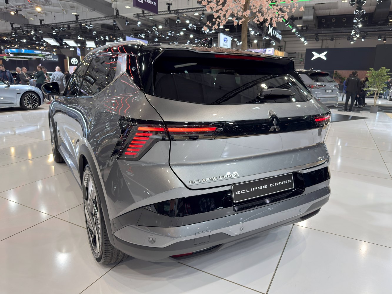 Rear view of a sleek electric SUV with distinctive taillight design