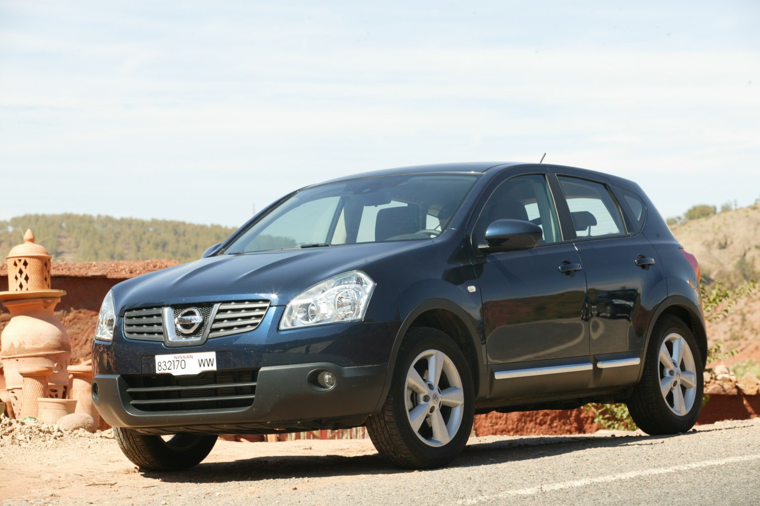 Compact five-door hatchback with prominent front grille and modern headlights