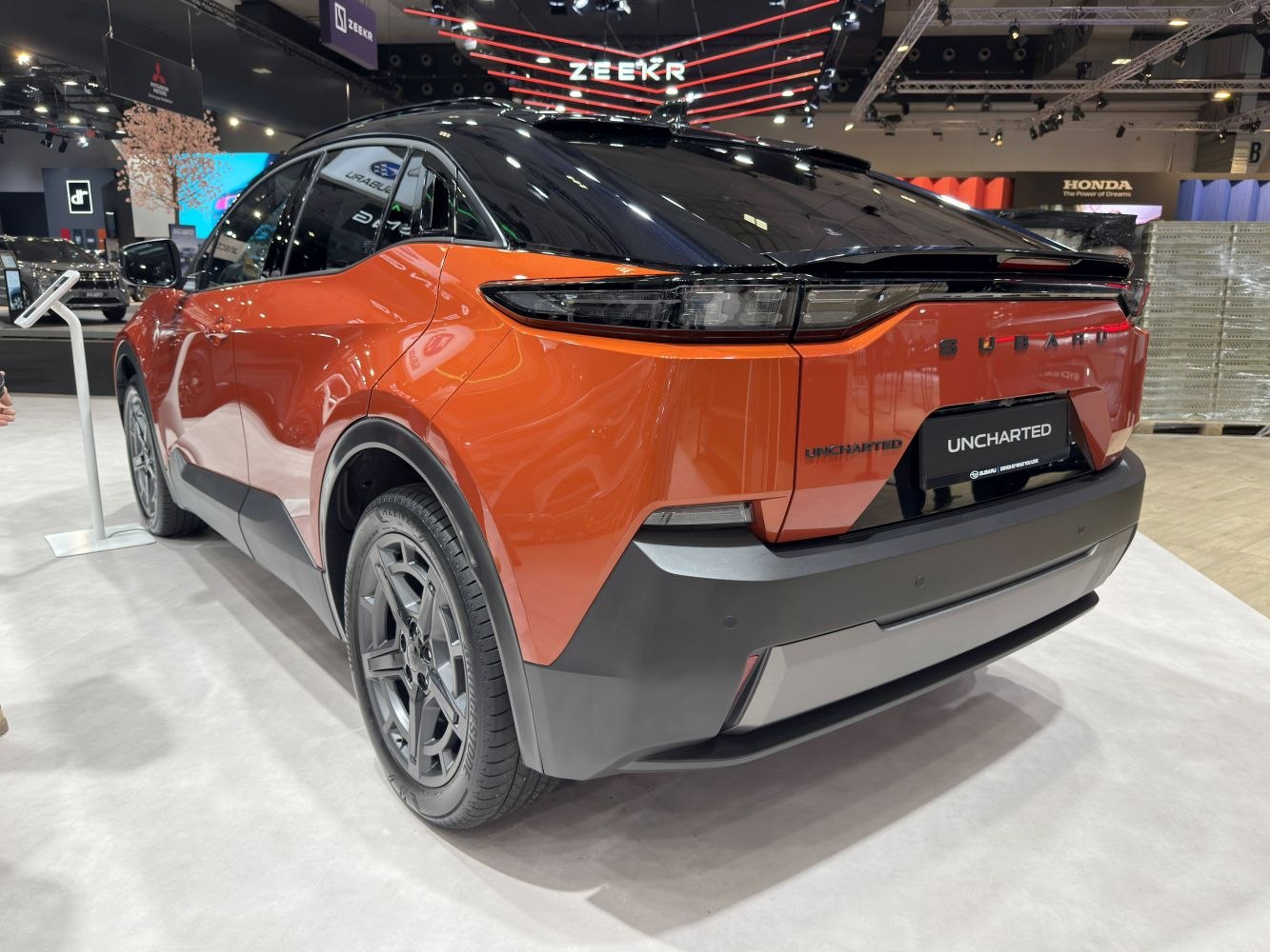 Sleek rear and side view with modern taillights and aerodynamic body lines