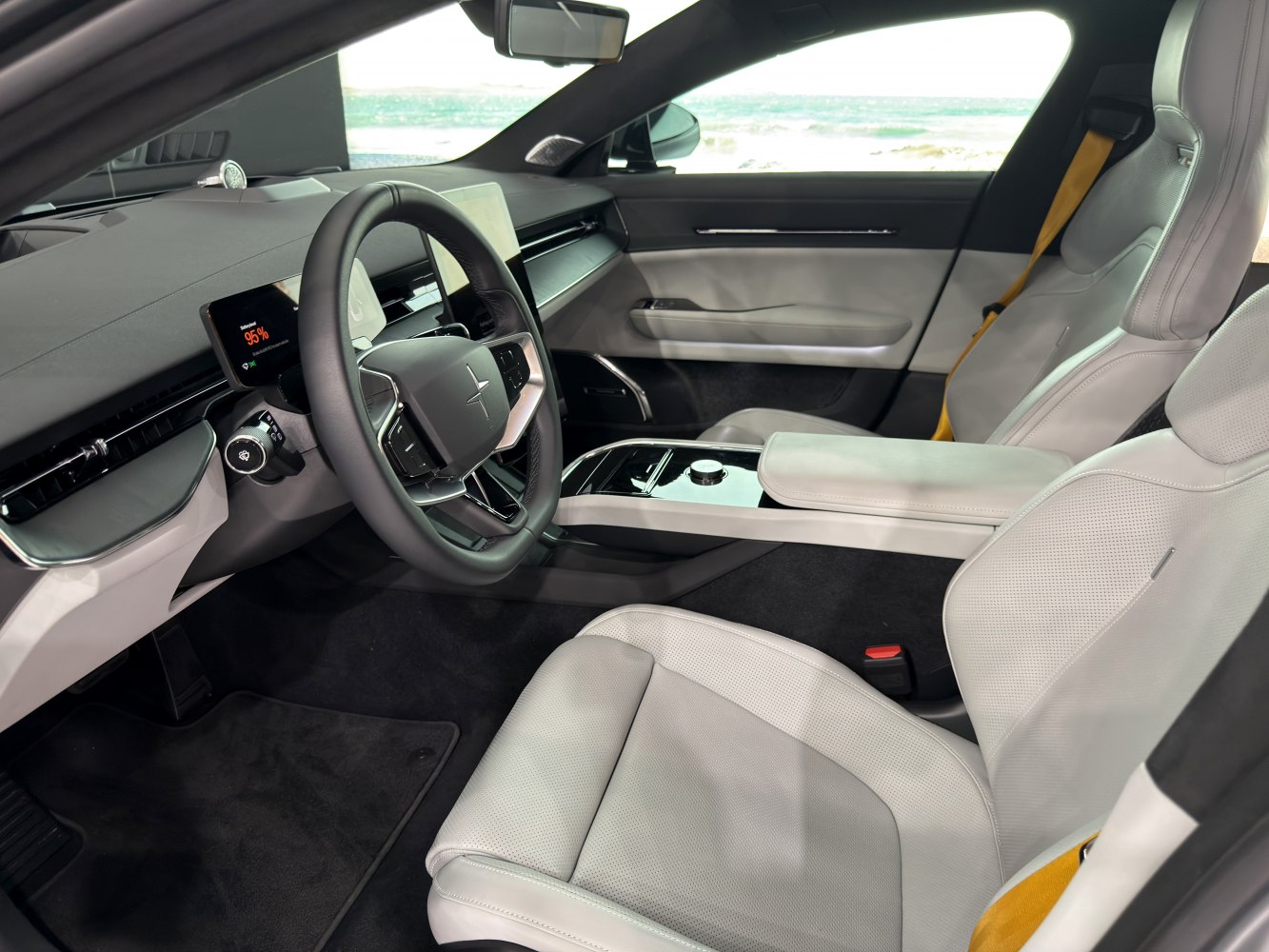 Minimalist modern car interior with digital displays and leather seats