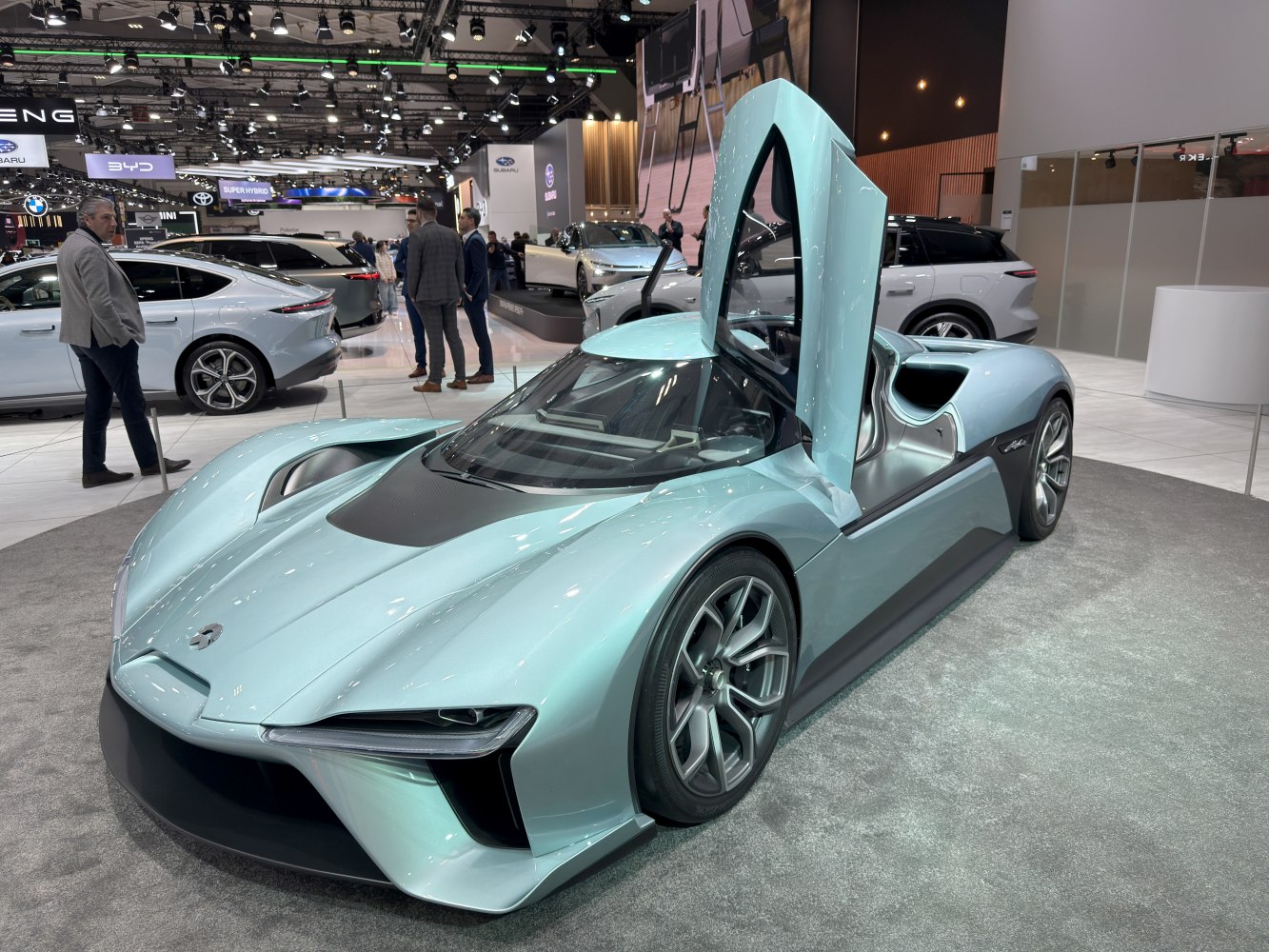 Sleek electric supercar with butterfly doors and aerodynamic body