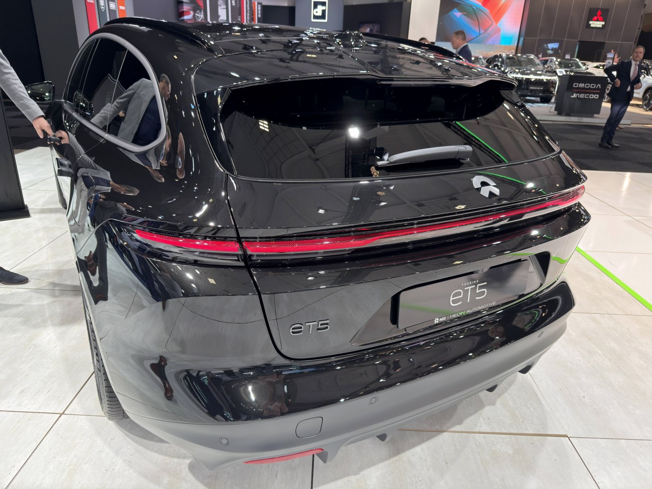 Rear view of hatchback with wrap-around light bar and integrated spoiler