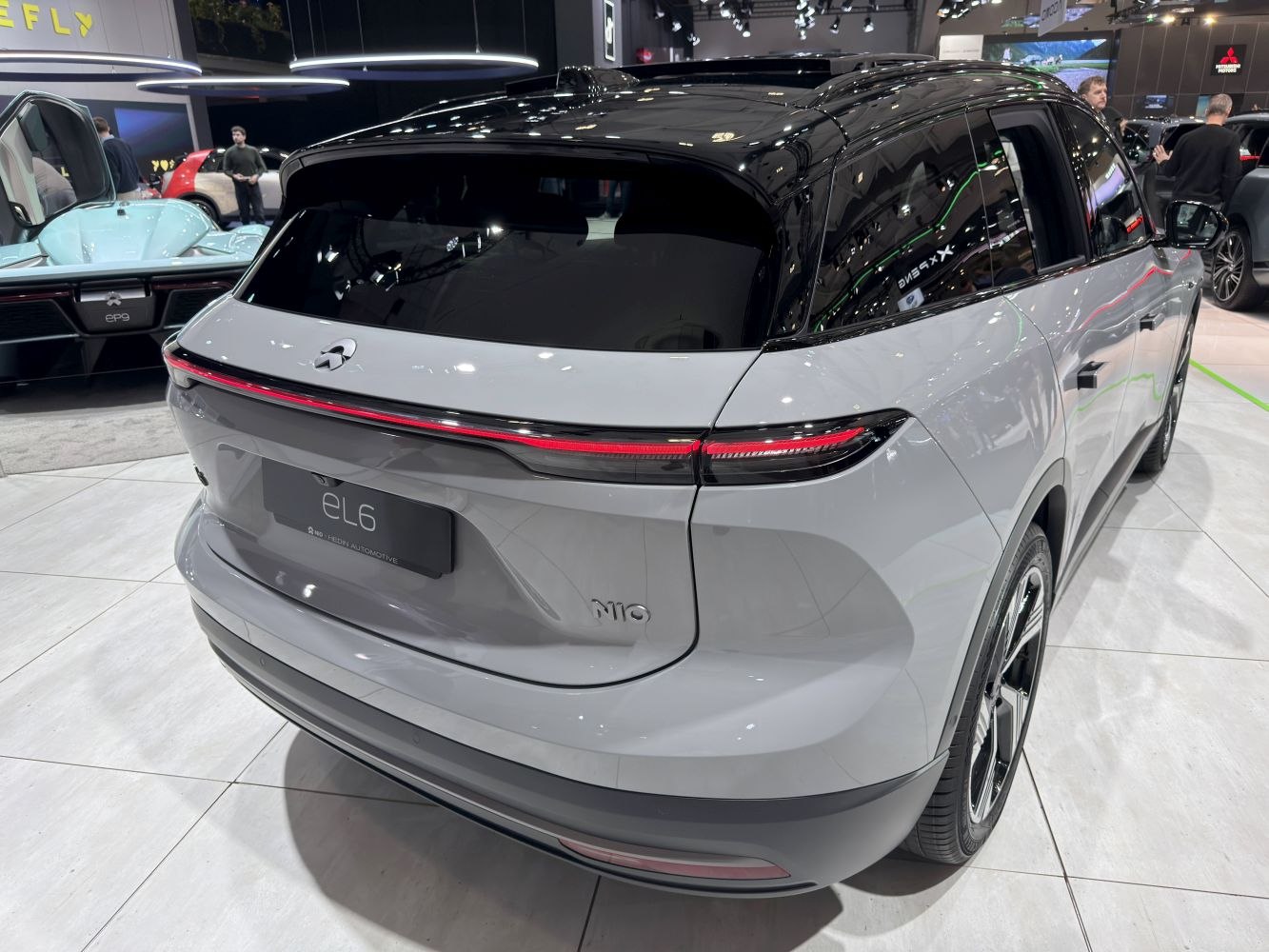 Rear view of electric SUV with continuous LED tail light