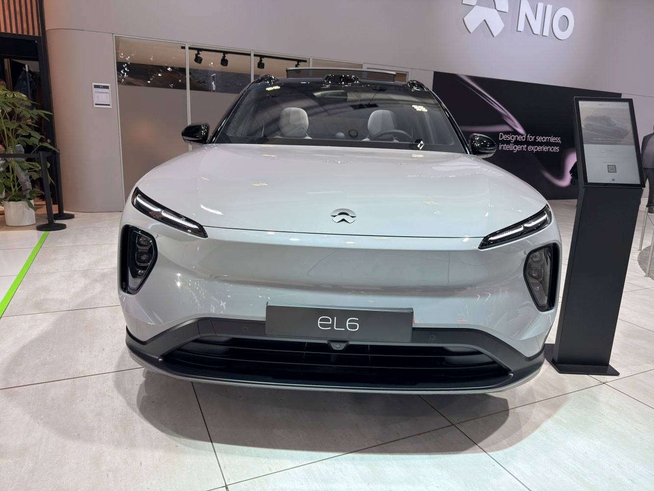 Sleek front view with slim LED headlights and aerodynamic hood